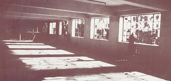 Old sepia photo of the CDS performance studio taken from an original 1980 programme pamphlet